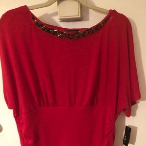 Alyx red top. Rhinestones around front of neck.